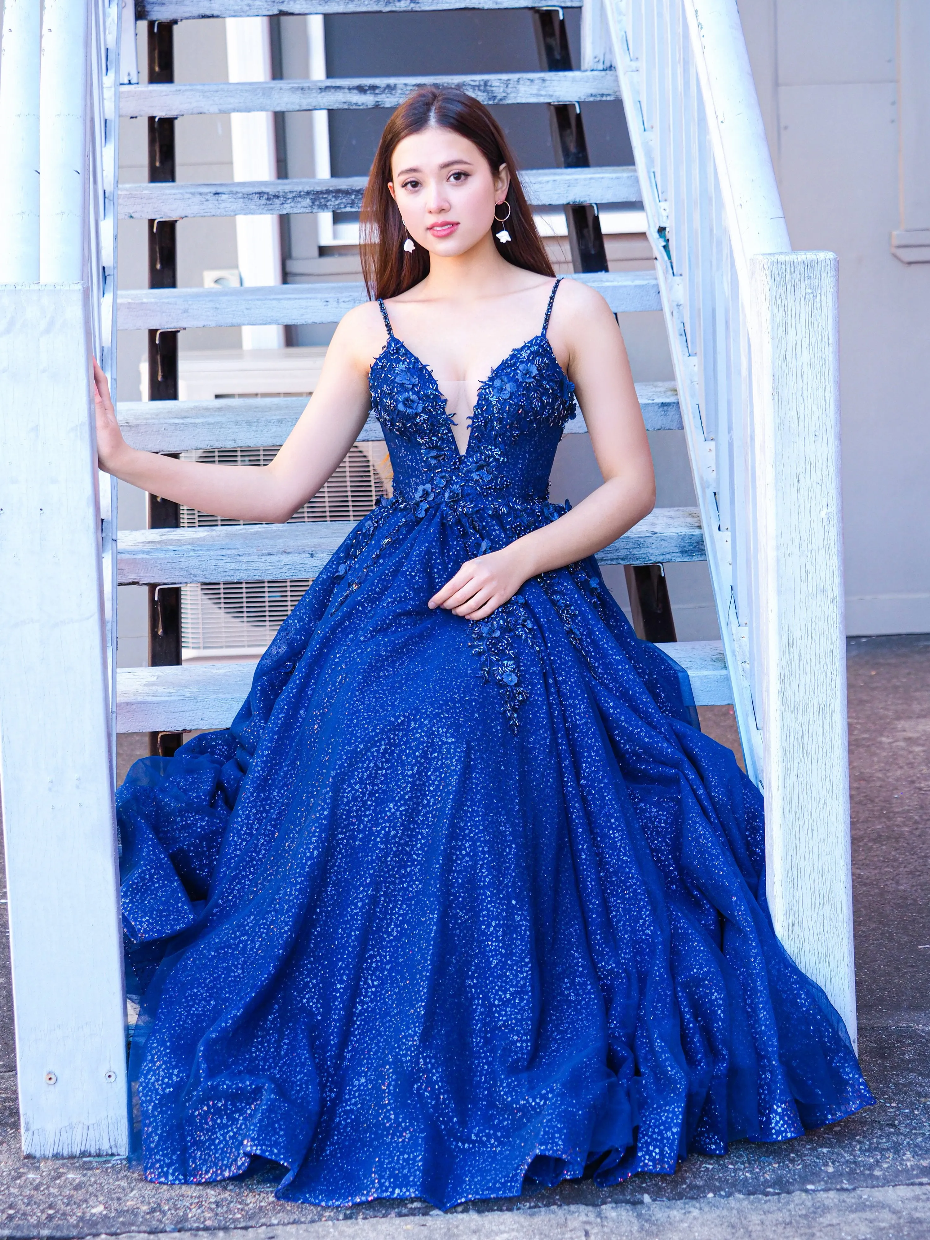 Sparkling navy blue 3D flower princess dress for hire
