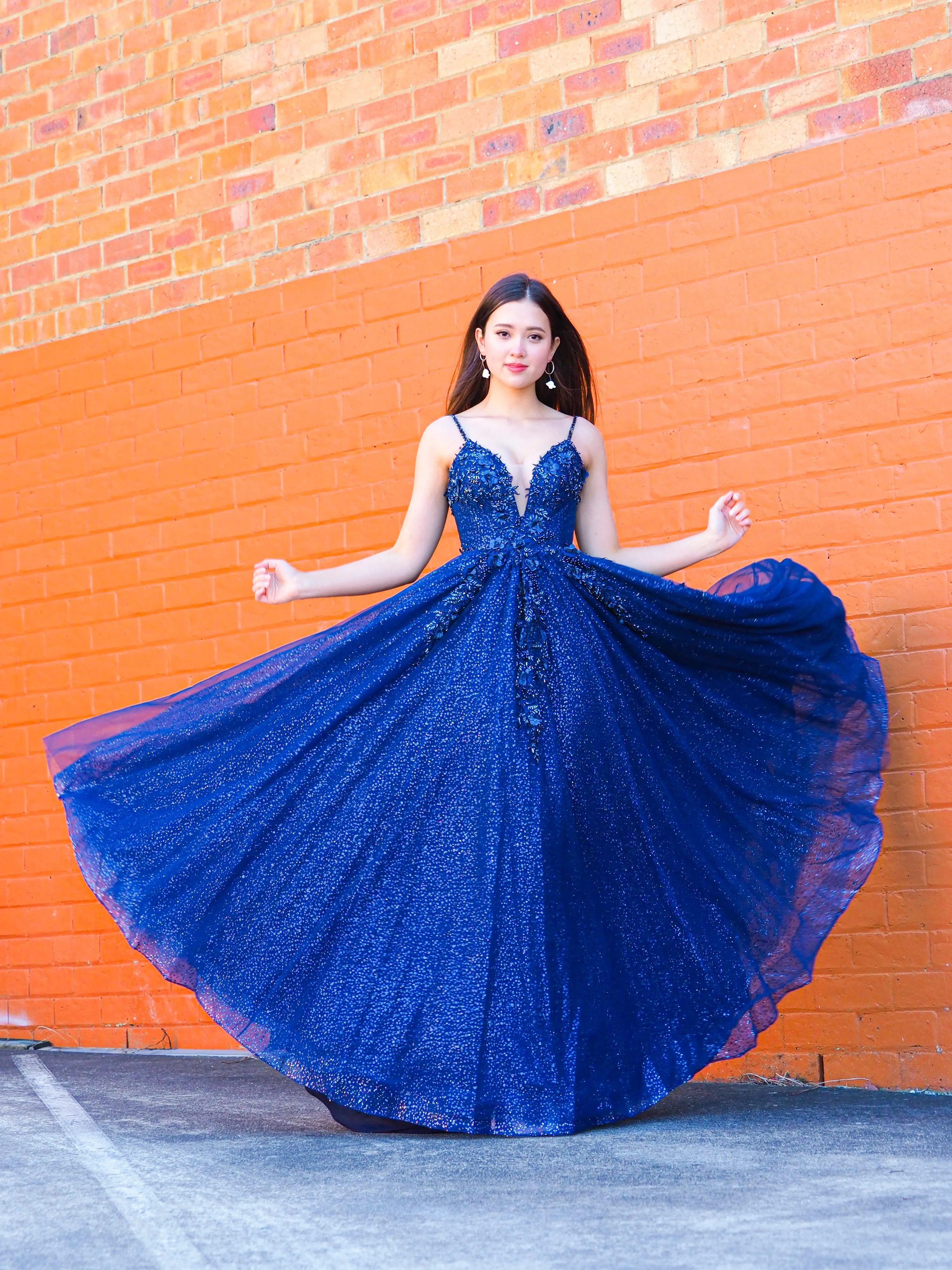 Sparkling navy blue 3D flower princess dress for hire