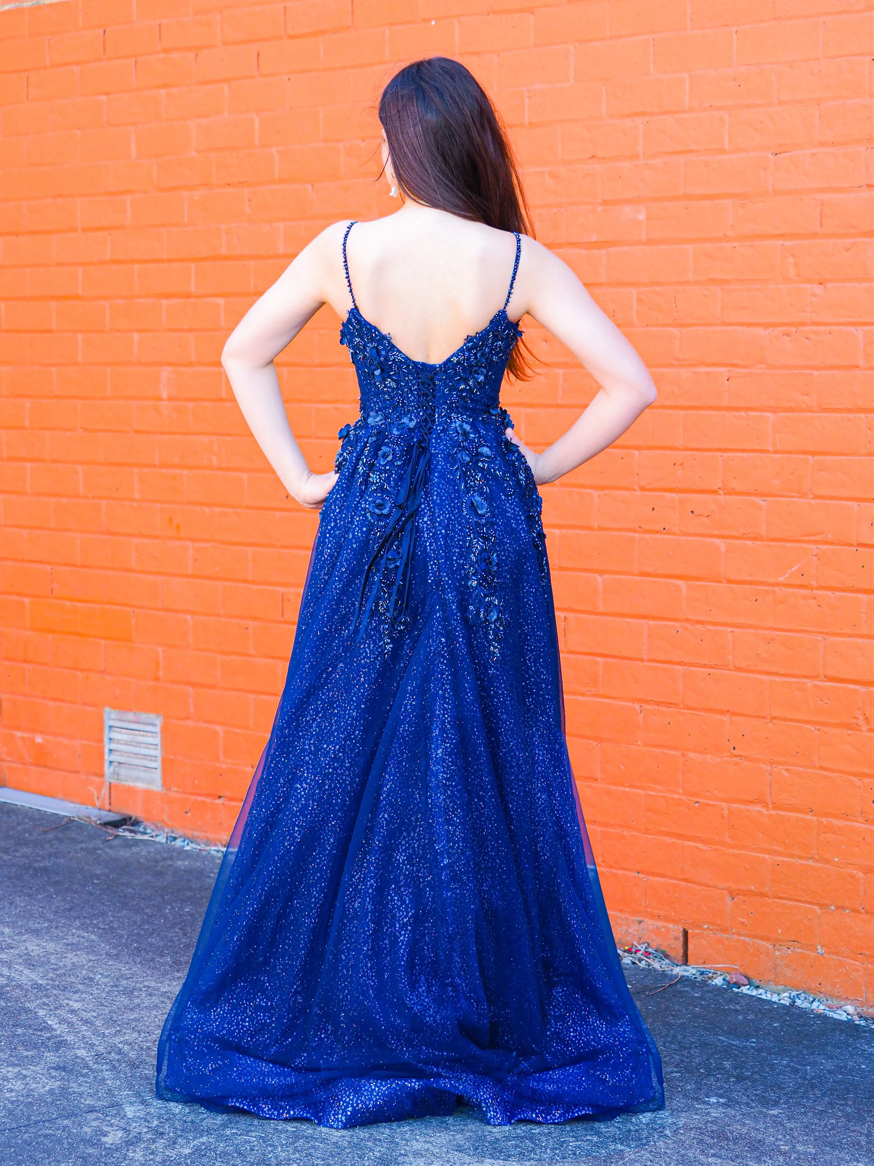 Sparkling navy blue 3D flower princess dress for hire