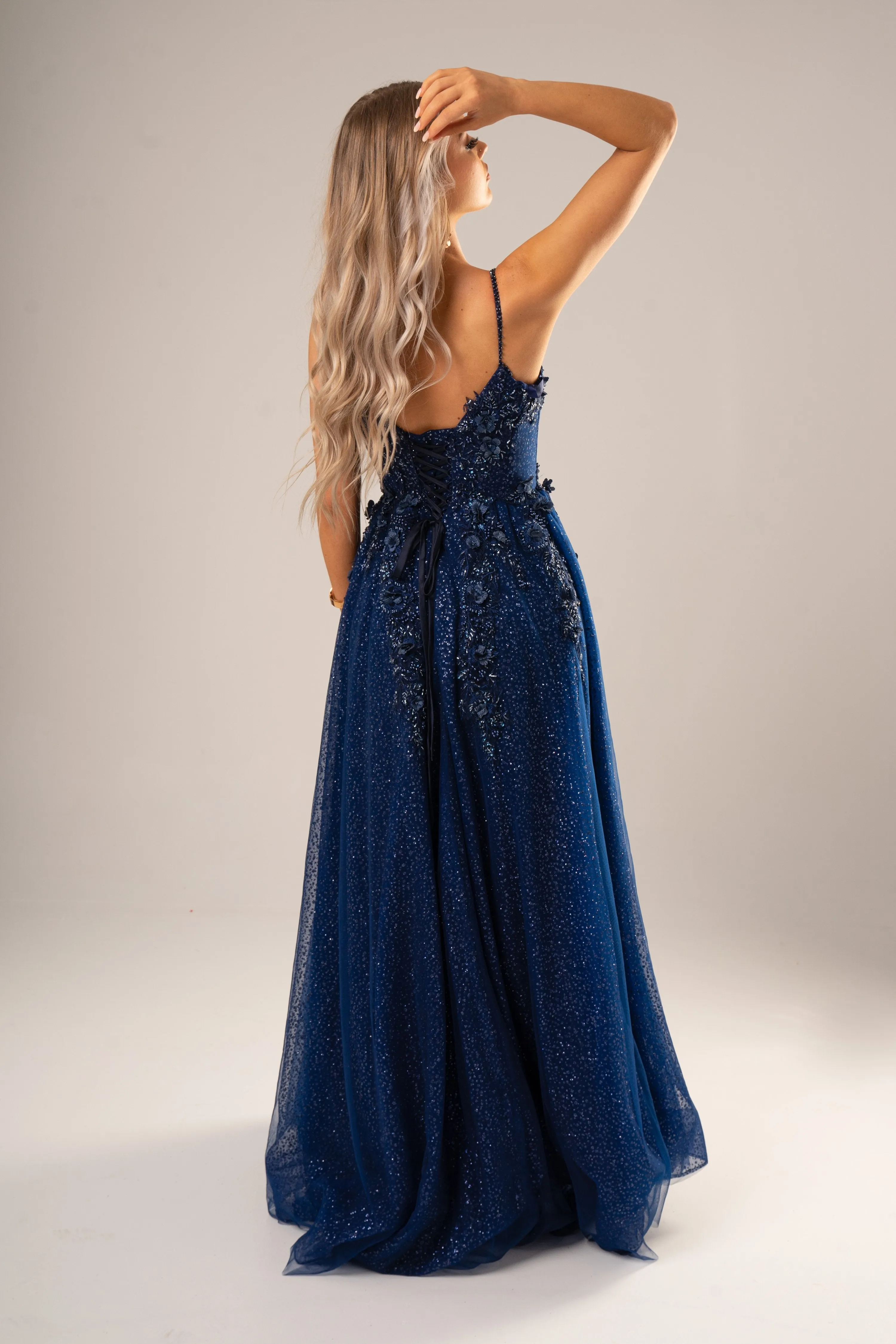 Sparkling navy blue 3D flower princess dress for hire
